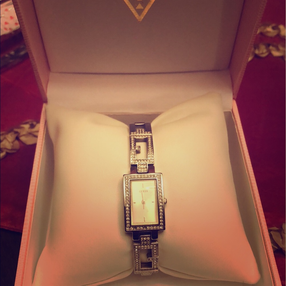 Women’s silver authentic guess watch